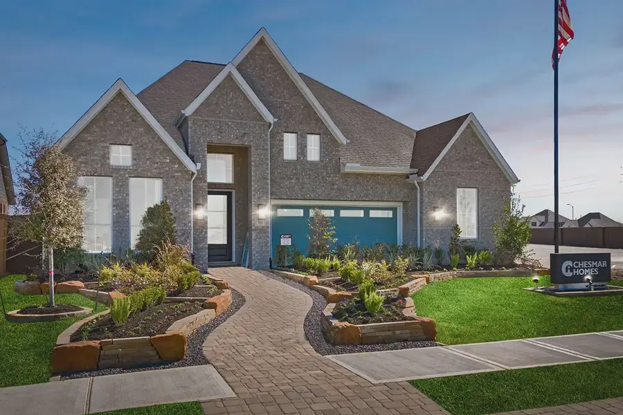 Front exterior of a home in the Brookewater 60's community, located in Rosenberg, TX (Image 10).
