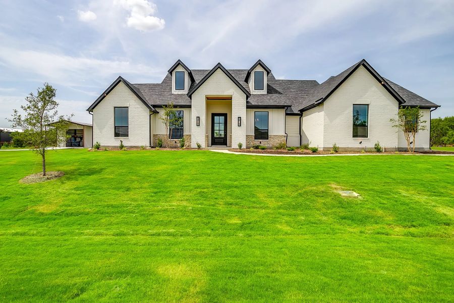 Front exterior of a home in the Cunningham Meadows community, located in Waxahachie, TX (Image 9). Front exterior of a home in the Cunningham Meadows community, located in Waxahachie, TX (Image 9).