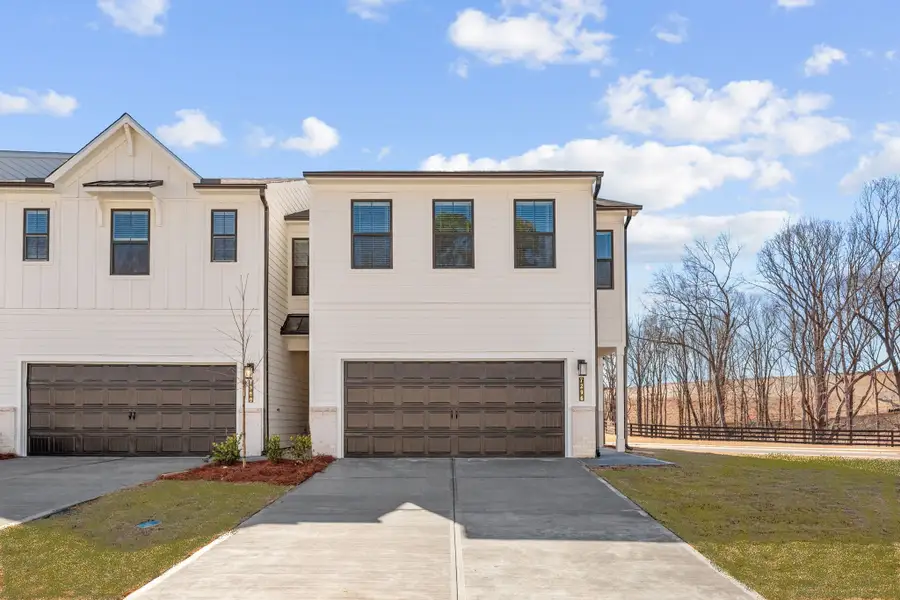 A house with a garage. A house with a garage.