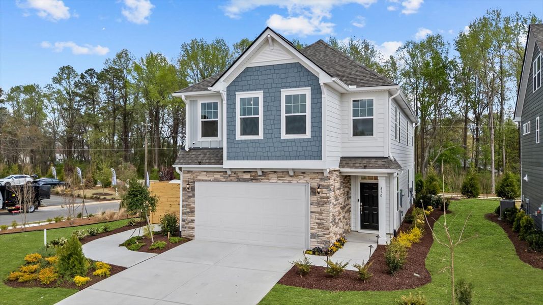 Front exterior of a home in the Station Pointe Phase 2 community, located in Angier, NC (Image 3).