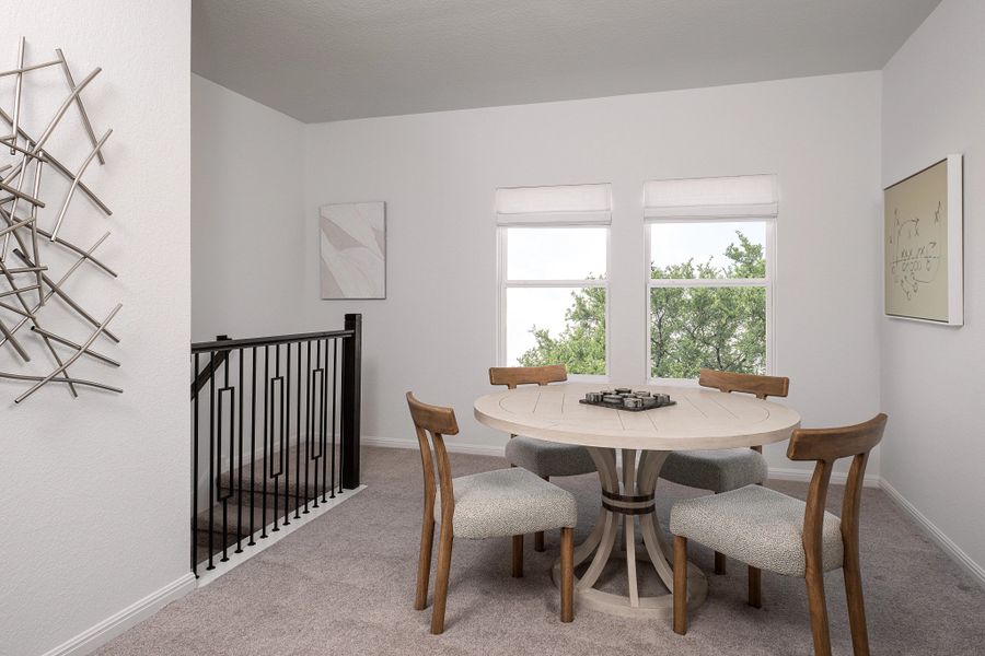 Furnished interior in a model home at The Colony in Bastrop (Image 14).