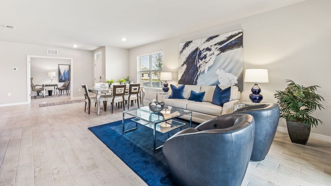 Furnished interior in a model home at Cove at West Port - Express in Port Charlotte (Image 27). Furnished interior in a model home at Cove at West Port - Express in Port Charlotte (Image 27).