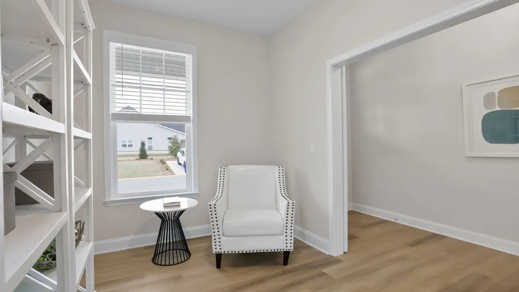 Furnished interior in a model home at Blue Ridge Trail in Fountain Inn (Image 7).