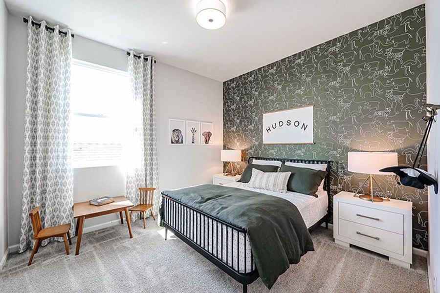 A bedroom with two beds.