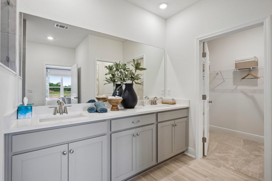 Furnished interior in a model home at Mahogany At Jubilee in Pace (Image 30).