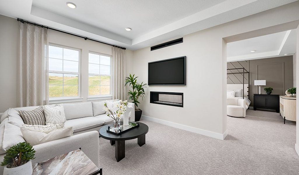 Furnished interior in a model home at Chateau at the Meadows in Castle Rock (Image 9).