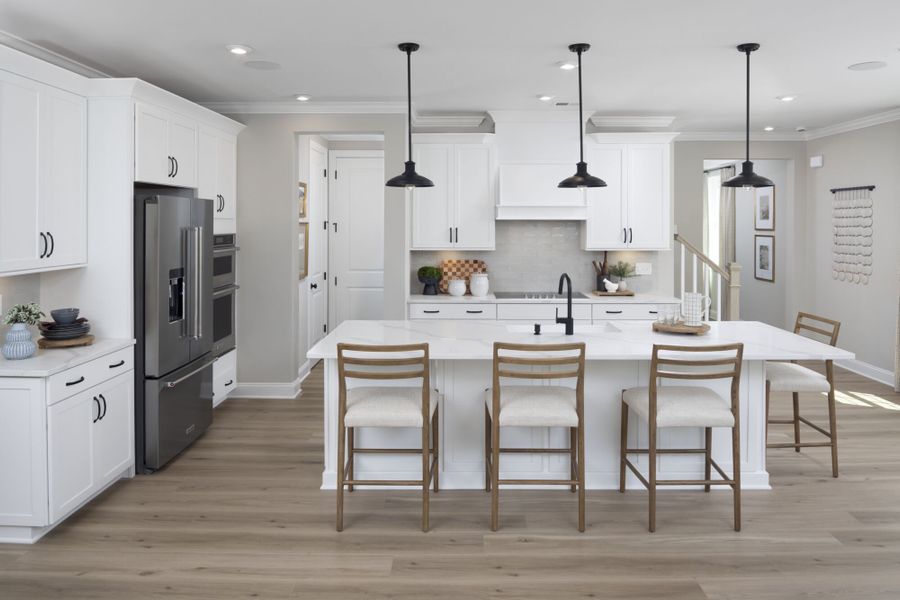 Furnished interior in a model home at The Townes at Wade Ardrey in Charlotte (Image 6).