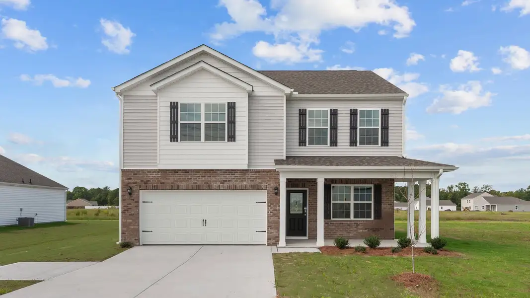 Front exterior of a home in the Dakota Creek community, located in Ayden, NC (Image 1).