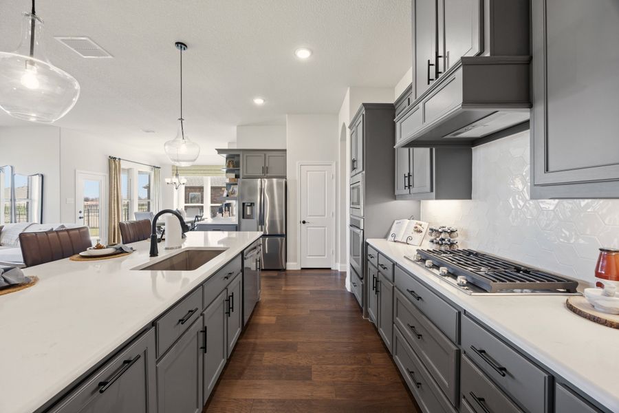 Furnished interior in a model home at Abe's Landing in Granbury (Image 7).