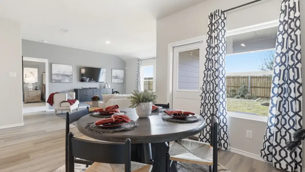 Furnished interior in a model home at Hadley Farms in Godley (Image 4).