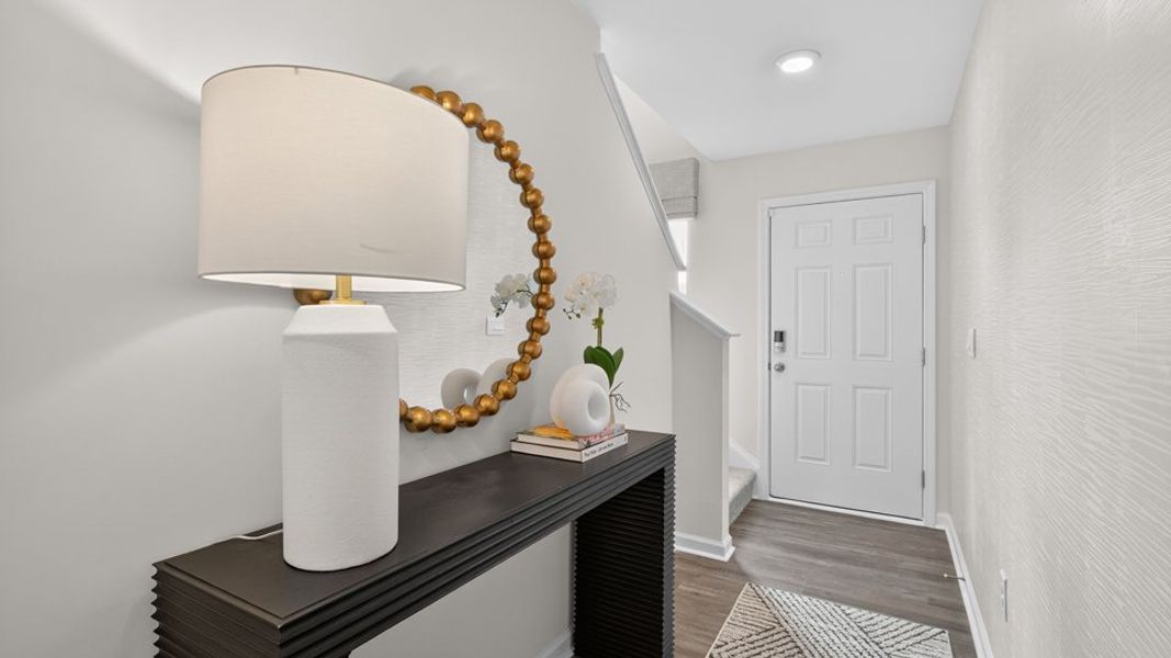 Furnished interior in a model home at The Townes at Belle Grove in Wendell (Image 10).