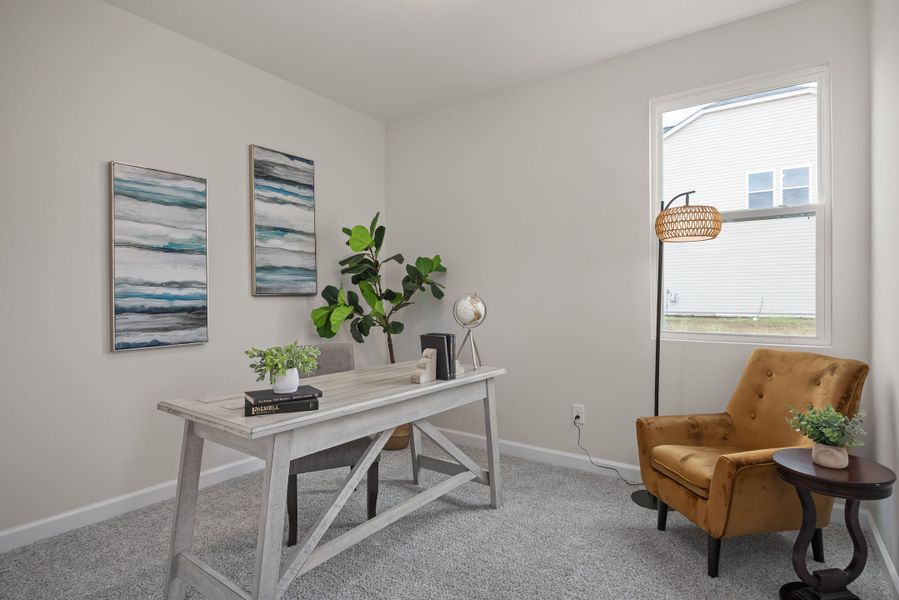 Furnished interior in a model home at Villas at Carpenter Woods in Durham (Image 5).