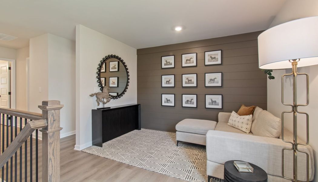 Furnished interior in a model home at Kentmere in Auburn (Image 43).