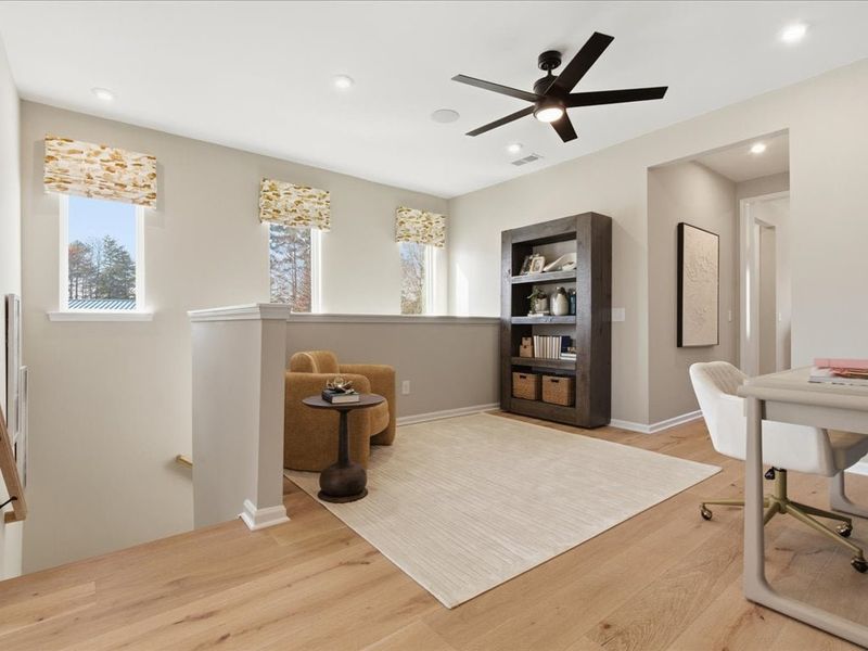 Furnished interior in a model home at Ellis Townes in Charlotte (Image 26).