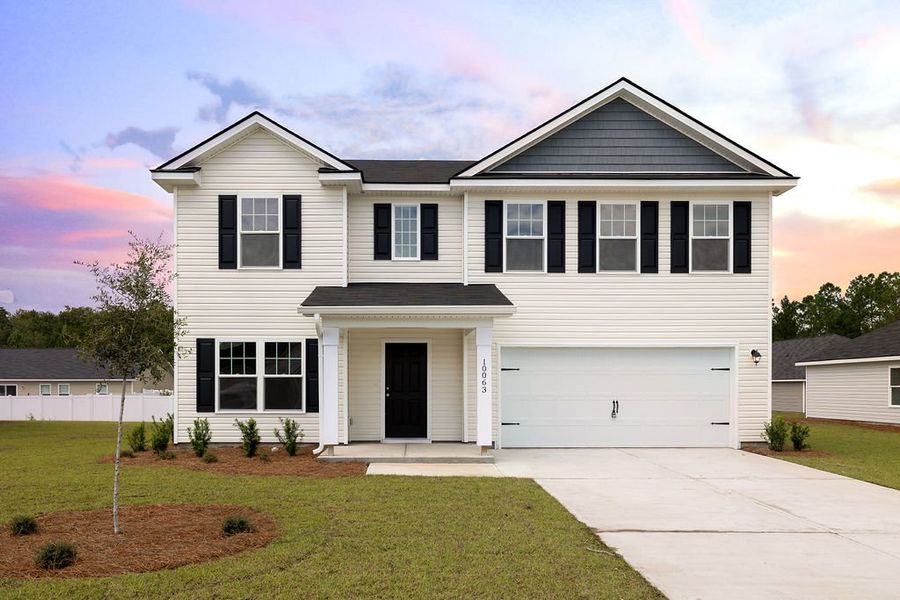 Front exterior of a home in the Woodland Cove community, located in Brunswick, GA (Image 7).