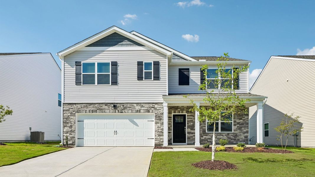 Front exterior of a home in the Westerly community, located in Lillington, NC (Image 12).