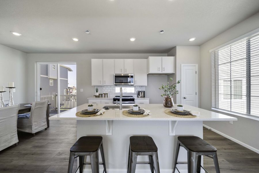 Furnished interior in a model home at Coach House at Green Valley Ranch in Aurora (Image 4).
