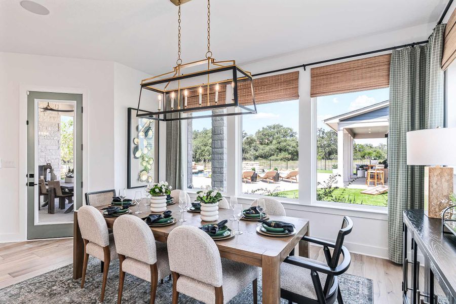 Furnished interior in a model home at Kissing Tree – Vista Series in San Marcos (Image 39).