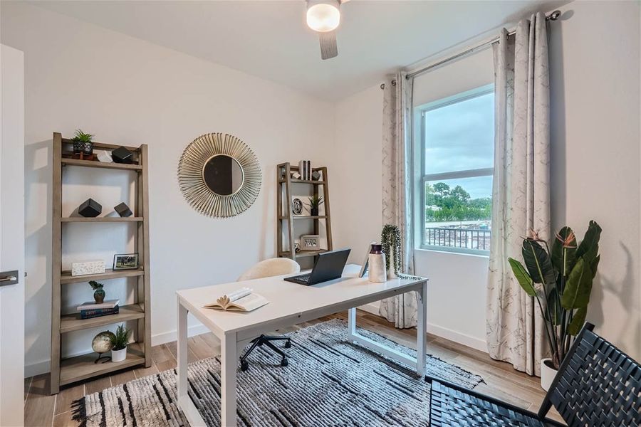 Furnished interior in a model home at Willow Pointe in Stuart (Image 34).