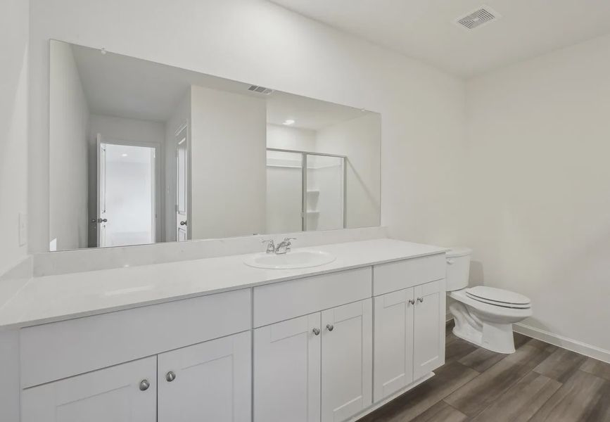 Furnished interior in a model home at Gateway Parks in Forney (Image 10).