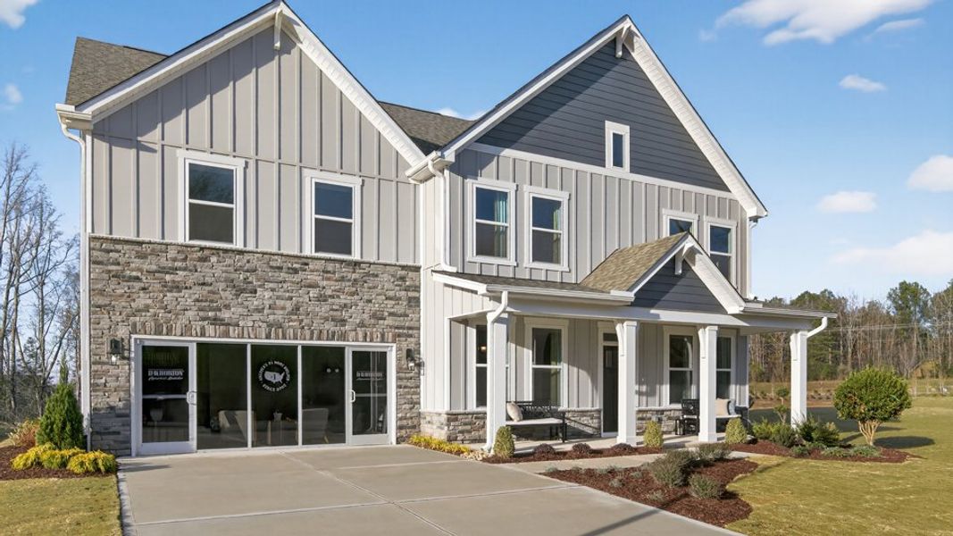 Front exterior of a home in the The Grove at Winston Pointe community, located in Clayton, NC (Image 13).