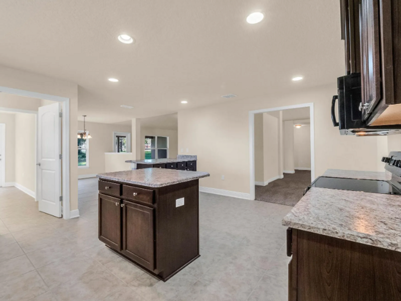 Furnished interior in a model home at Pine Ridge in Beverly Hills (Image 11).