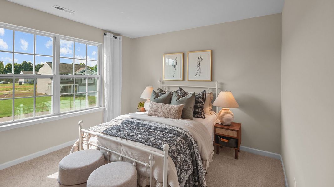 Furnished interior in a model home at The Preserve at Kinsley in Jamestown (Image 24).