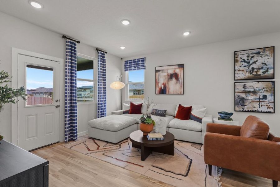 A living room with a couch and a coffee table.