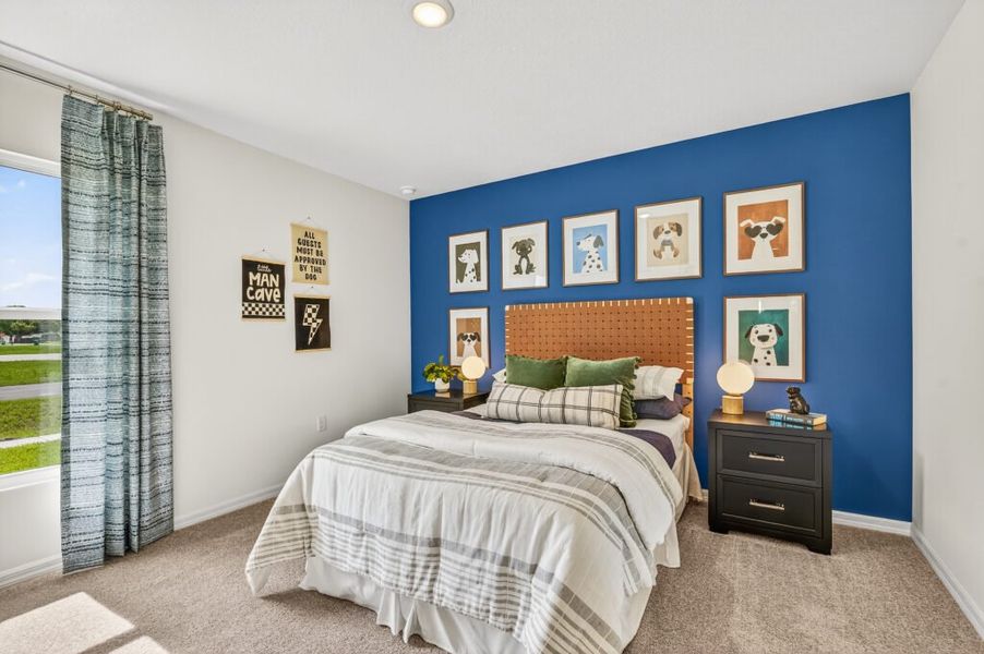 Furnished interior in a model home at Mallard Landing in Okeechobee (Image 16).