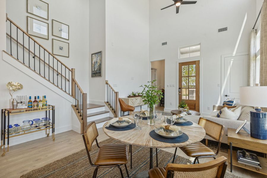 Furnished interior in a model home at Newman Village Townhomes in Frisco (Image 18).