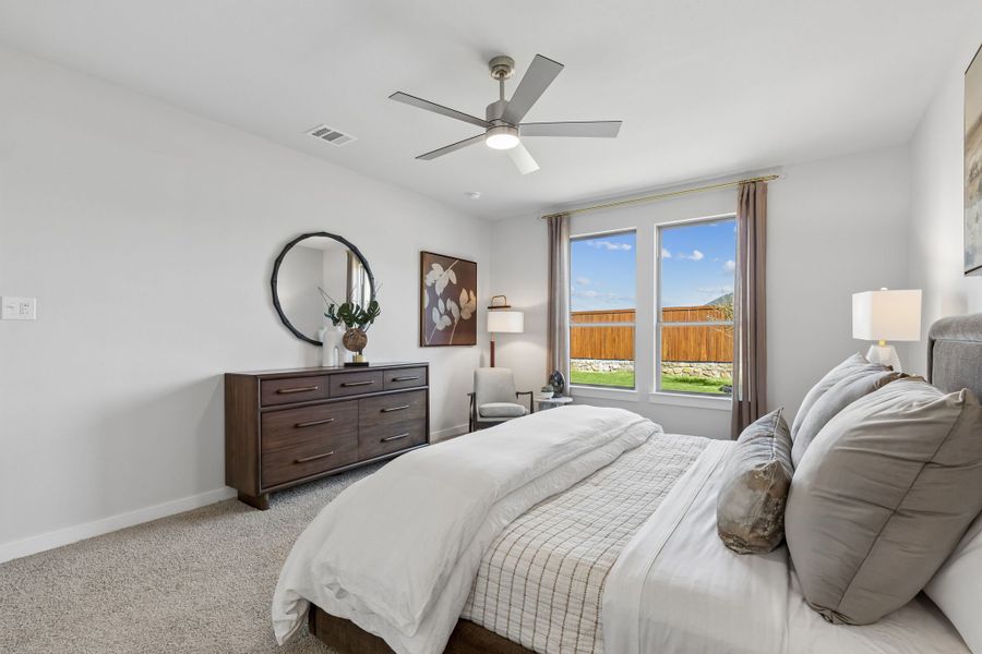 Primary Suite in the Winters model home in Gunter TX by Trophy Signature Homes