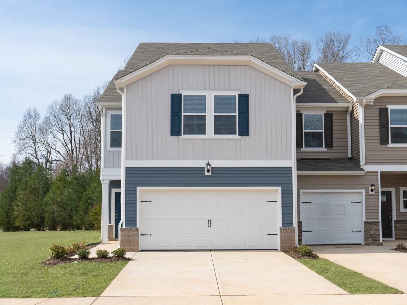 Front exterior of a home in the Oakwood Townes community, located in Mebane, NC (Image 2).