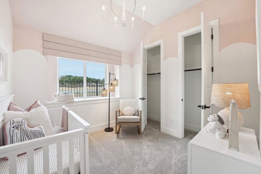 Furnished interior in a model home at Grande Estates in Bertram (Image 11).