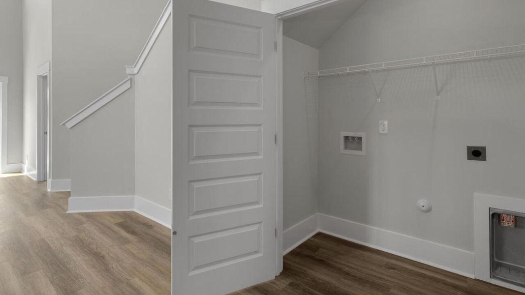 Furnished interior in a model home at Indigo Preserve Townhomes in Leland (Image 6).