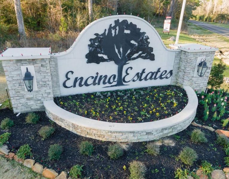 Entrance to the Encino Estates community in Dayton, TX, featuring signage and landscaping (Image 1). Entrance to the Encino Estates community in Dayton, TX, featuring signage and landscaping (Image 1).