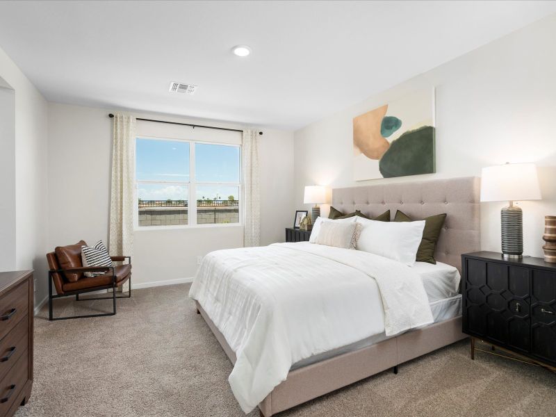 Furnished interior in a model home at Entrada Estate Series in Tolleson (Image 6).