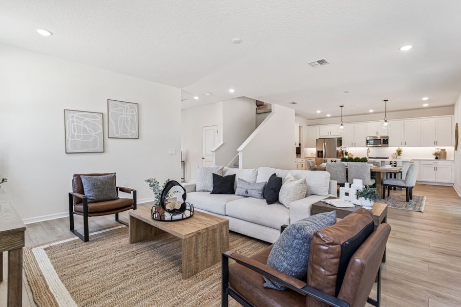 Furnished interior in a model home at Estes Reserve in Eustis (Image 13).