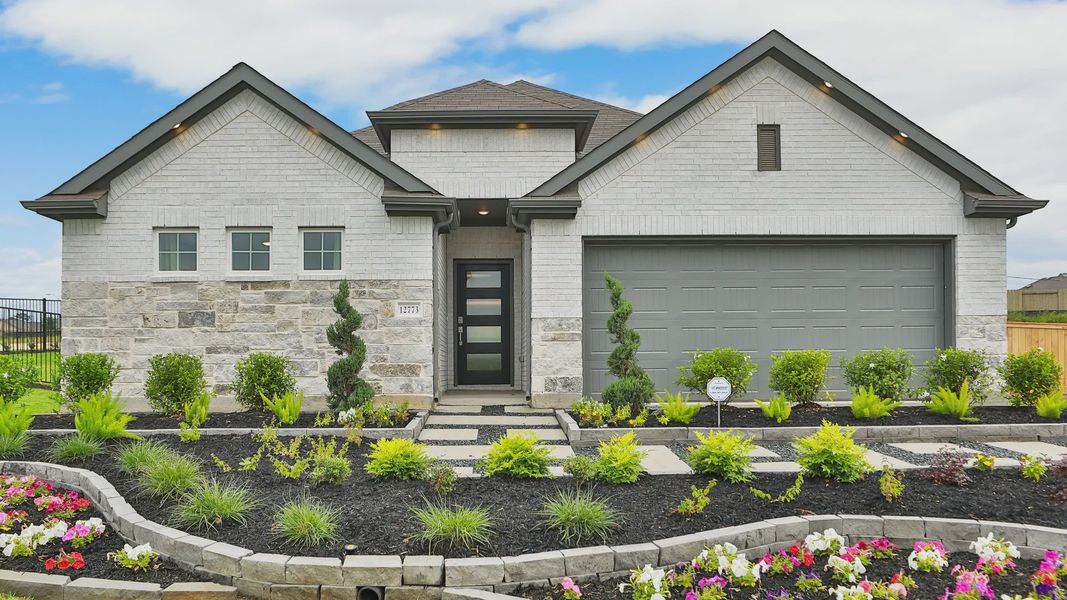 Stunning brick facade and manicured landscaping define this Mostyn Springs residence, showcasing elegance and charm. Stunning brick facade and manicured landscaping define this Mostyn Springs residence, showcasing elegance and charm.