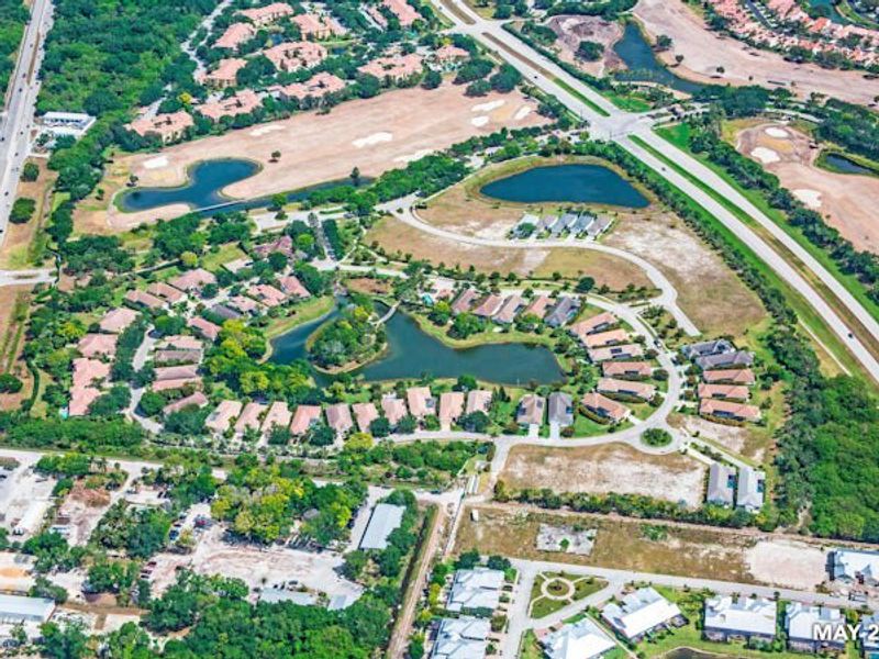 Aerial view of the The Falls at Grand Harbor community in Vero Beach, FL, showing layout and nearby surroundings (Image 23).