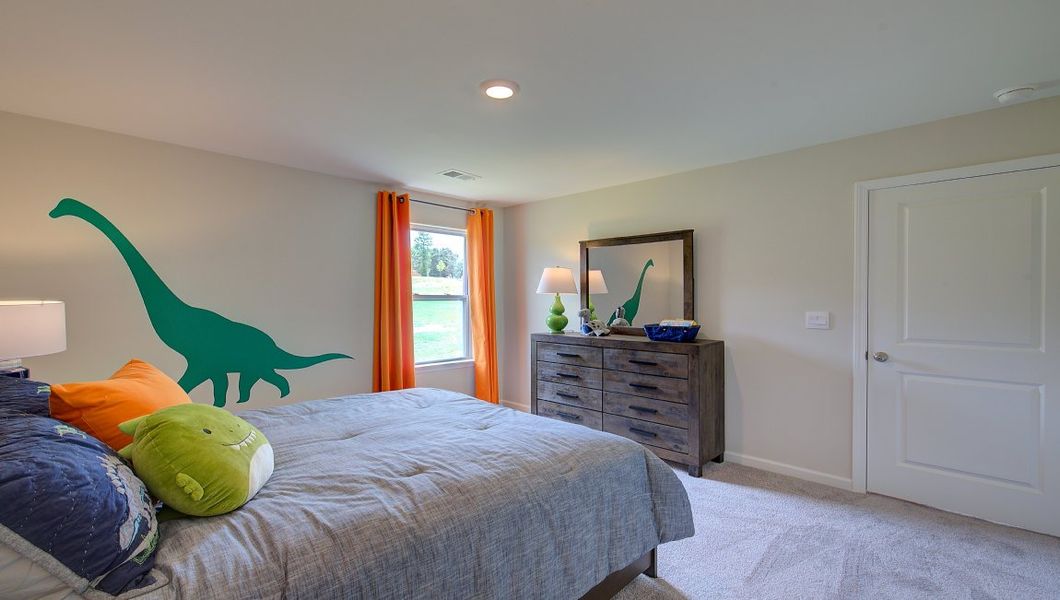 Furnished interior in a model home at Tap Root Farms in Fletcher (Image 28).