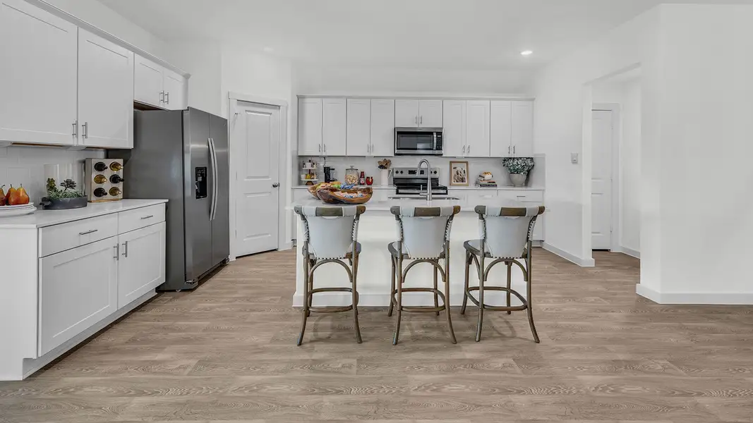 Furnished interior in a model home at Sonoma Oaks in Fredericksburg (Image 20).