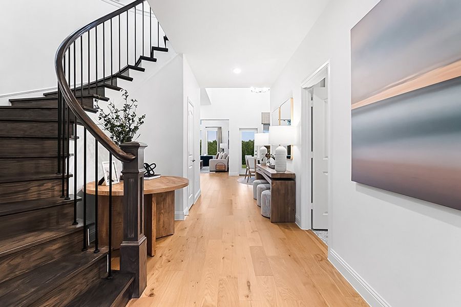 Furnished interior in a model home at The Reserve at Spiritas Ranch in Little Elm (Image 11).