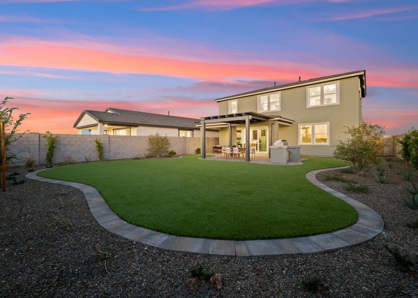 A house with a large front yard.