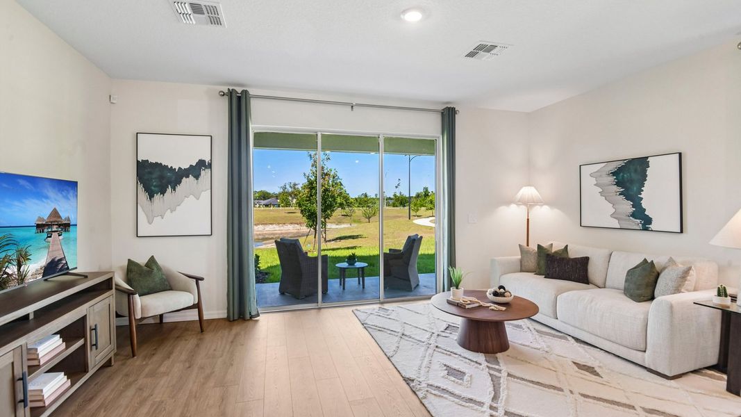 Furnished interior in a model home at Sanctuary at Citrus Park Townhomes in Tampa (Image 13).