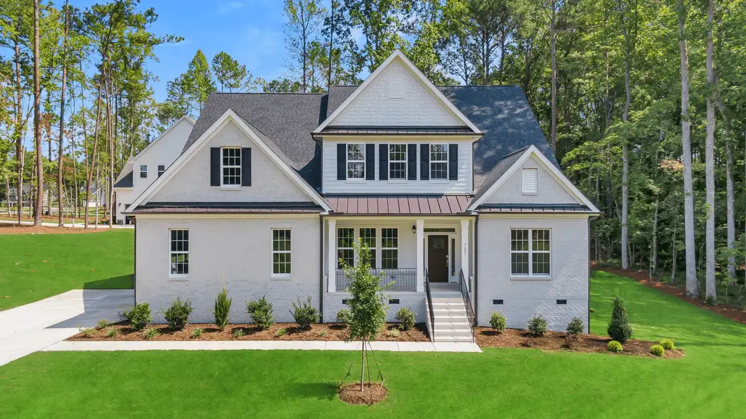 Front exterior of a home in the The Summit at Morgan Ridge community, located in Chapel Hill, NC (Image 1). Front exterior of a home in the The Summit at Morgan Ridge community, located in Chapel Hill, NC (Image 1).