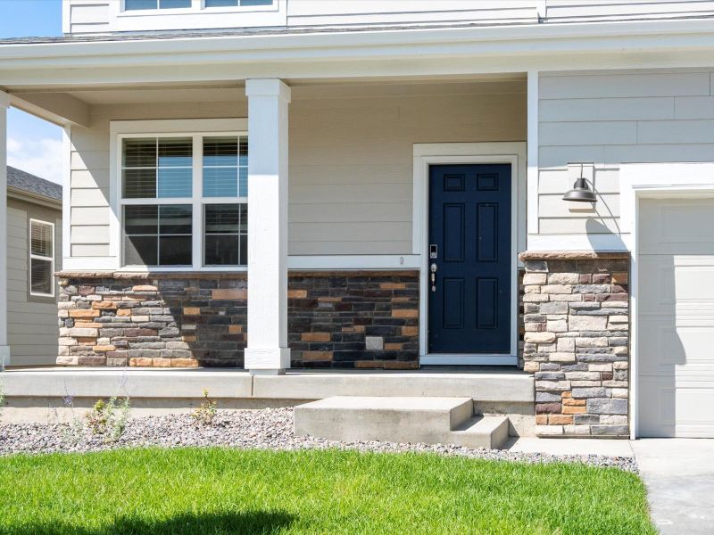 The Evergreen floorplan exterior image taken at a Meritage Homes community in Northern Colorado.