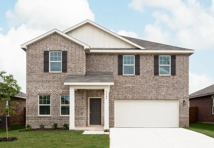 Front exterior of a home in the Sunterra Lakes community, located in Brookshire, TX (Image 3).
