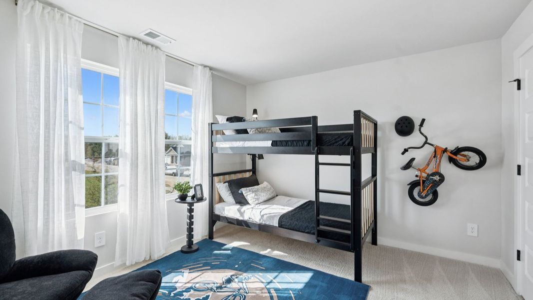 Furnished interior in a model home at Harvest Point in Spring Hill (Image 45).