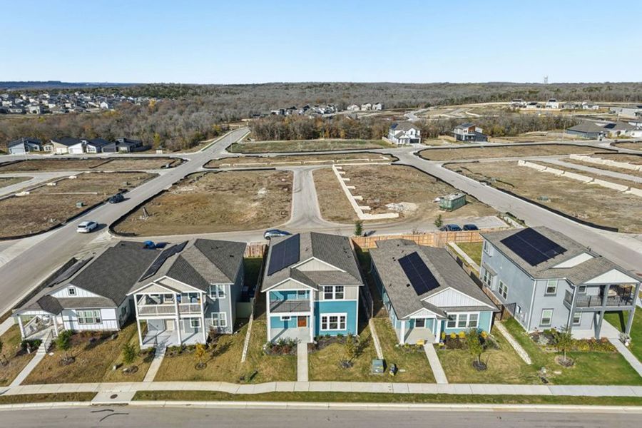 Aerial view of the Whisper Valley community in Manor, TX, showing layout and nearby surroundings (Image 12). Aerial view of the Whisper Valley community in Manor, TX, showing layout and nearby surroundings (Image 12).