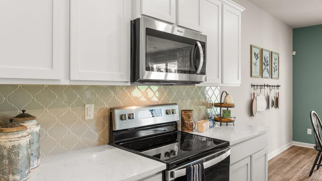 Furnished interior in a model home at Twin Lakes in Hoschton (Image 45).